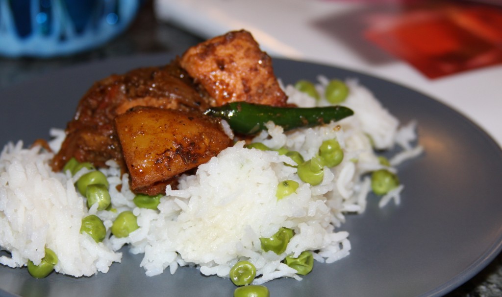 Garlic salmon with potatoes and peas pulao