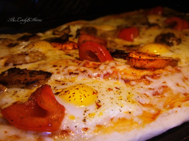 quail egg cheese pizza